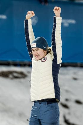 PREDAZZO, ITALY - FEBRUARY 7: Anna Odine Stroem (Norway) jumps on the podium after winning Gold during the Ski jumping, Skispringen, Ski, nordisch Women s Normal Hill Individual at the Milano Cortina 2026 Olympics at Predazzo Ski Jumping Stadium on day 2 of the Milano Cortina 2026 Olympics on February 7, 2026 in Predazzo, Italy. Editorial use only. Trentino-Suedtirol Italy Copyright: xSteffiexWunderlx
