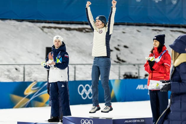 PREDAZZO, ITALY - FEBRUARY 7: Anna Odine Stroem (Norway) jumps on the podium after winning Gold during the Ski jumping, Skispringen, Ski, nordisch Women s Normal Hill Individual at the Milano Cortina 2026 Olympics at Predazzo Ski Jumping Stadium on day 2 of the Milano Cortina 2026 Olympics on February 7, 2026 in Predazzo, Italy. Editorial use only. Trentino-Suedtirol Italy Copyright: xSteffiexWunderlx