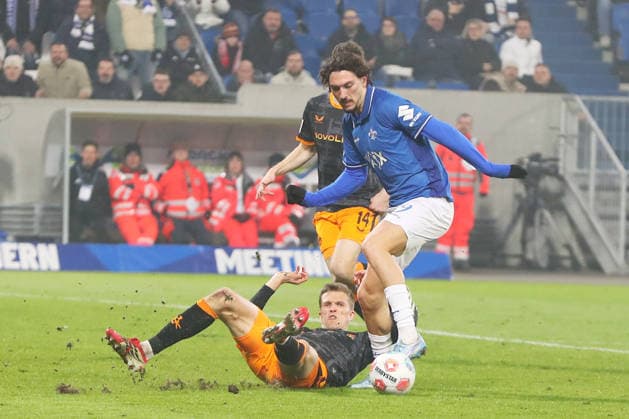 07.02.2026, xtvx, Fussball 2.Bundesliga, SV Darmstadt 98 - 1.FC Kaiserslautern v.l. Zweikampf, Duell, duel, tackle, compete Fabian Kunze (1. FC Kaiserslautern) Fraser Hornby (SV Darmstadt 98) (DFL DFB REGULATIONS PROHIBIT ANY USE OF PHOTOGRAPHS as IMAGE SEQUENCES and or QUASI-VIDEO) Darmstadt