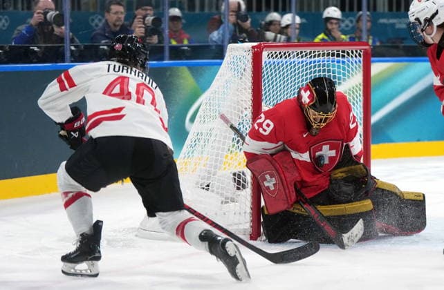 February 7, 2026, Milan, ITALY: CanadaöÄÃ s Blayre Turnbull (40) is stopped by Switzerland goalie Saskia Maurer (29) during the first period of a preliminary round women s hockey game at the Milan Cortina Winter Olympics, in Milan, on Saturday, Feb. 7, 2026. Canada News - February 7, 2026  - ZUMAc35_ 20260207_zaf_c35_086 Copyright: xDarrylxDyckx