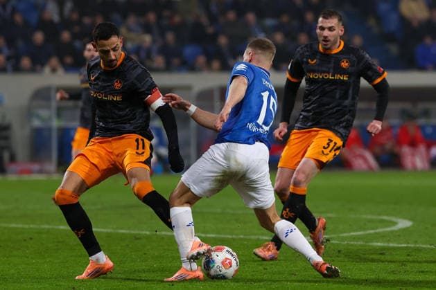FBL-Germany 2.Bundesliga SV Darmstadt 98 - 1.FC Kaiserslautern Kenny Redondo (1.FC Kaiserslautern), Fabian Nürnberger (SV Darmstadt 98) battles for the Ball during the 2.Bundesliga 2025-26 match between SV Darmstadt 98 and 1.FC Kaiserslautern at Merckstadion am Böllenfalltor on 7 February 2026 in Darmstadt, Germany (DFL DFB REGULATIONS PROHIBIT ANY USE OF PHOTOGRAPHS as IMAGE SEQUENCES and or QUASI-VIDEO)