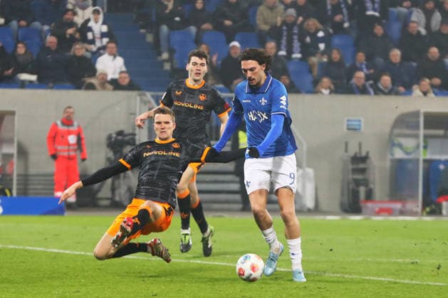 07.02.2026, xtvx, Fussball 2.Bundesliga, SV Darmstadt 98 - 1.FC Kaiserslautern v.l. Zweikampf, Duell, duel, tackle, compete Fabian Kunze (1. FC Kaiserslautern) Fraser Hornby (SV Darmstadt 98) (DFL DFB REGULATIONS PROHIBIT ANY USE OF PHOTOGRAPHS as IMAGE SEQUENCES and or QUASI-VIDEO) Darmstadt