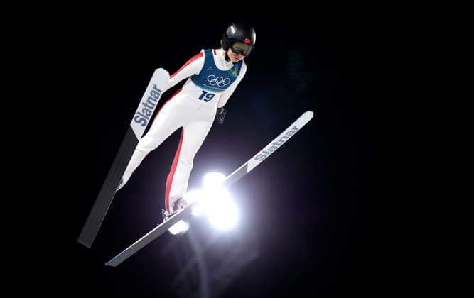 (260207) -- PREDAZZO, Feb. 7, 2026 -- Dong Bing of China competes during the first round of the Ski jumping, Skispringen, Ski, nordisch women s normal hill individual at the Milan-Cortina 2026 Olympic Winter games, Winterspiele,Spiele, Summer games in Predazzo, Italy, Feb. 7, 2026. ) (MICO2026)ITALY-PREDAZZO-OLYMPIC WINTER GAMES-SKI JUMPING-WOMEN S NORMAL HILL INDIVIDUAL HuangxWei 