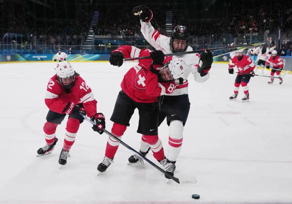 260207 -- MILAN, Feb. 7, 2026 -- Alessia Baechler C of Switzerland vies with Brianne Jenner R of Canada during the Ice hockey, Eishockey women s preliminary round group A match between Switzerland and Canada at the Milan-Cortina 2026 Olympic Winter games, Winterspiele,Spiele, Summer games in Milan, Italy, Feb. 7, 2026. MICO2026ITALY-MILAN-OLYMPIC WINTER GAMES-ICE HOCKEY-WOMEN-PRELIMINARY ROUND-SUI VS CAN TaoxXiyi  (MICO2026)ITALY-MILAN-OLYMPIC WINTER GAMES-ICE HOCKEY-WOMEN-PRELIMINARY ROUND-SUI VS CAN IMAGO TaoxXiyi  imago images 0847045619