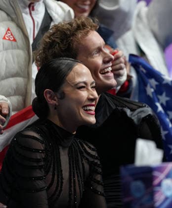 (260208) -- MILAN, Feb. 8, 2026 -- Madison Chock (L) Evan Bates of the United States react to their scores after performing during the free dance of ice dance skating for Figure skating, Eiskunstlauf team event at the Milan-Cortina 2026 Olympic Winter games, Winterspiele,Spiele, Summer games in Milan, Italy, Feb. 7, 2026. ) (MICO2026)ITALY-MILAN-OLYMPIC WINTER GAMES-FIGURE SKATING TEAM EVENT-ICE DANCE-FREE DANCE ChengxMin 