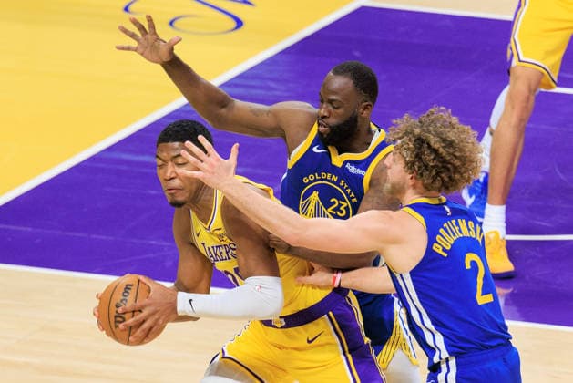 February 7, 2026, Los Angeles, California, USA: Rui Hachimura 28 of the Los Angeles Lakers tries to pass away from Draymond Green 23 and Brandin Podziemski 2 of the Golden State Warriors during a regular season NBA, Basketball Herren, USA game on Saturday February 7, 2026 at Crypto.com Arena in Los Angeles, California. Lakers defeat Warriors, 105-99. JAVIER ROJAS PI Lakers Vs. Warriors  - ZUMAp124 20260207_zaa_p124_031 Copyright: xJavierxRojasx