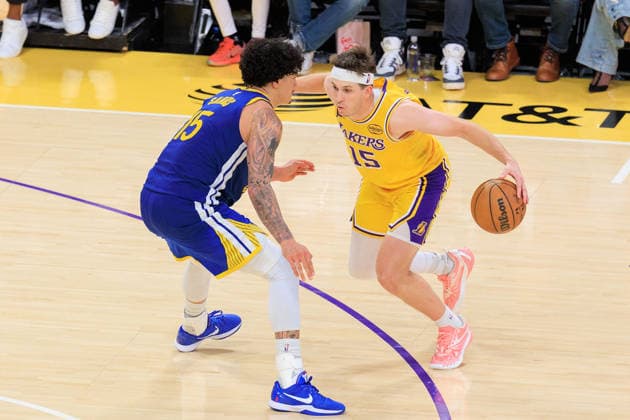February 7, 2026, Los Angeles, California, USA: Austin Reaves 15 of the Los Angeles Lakers tries to get past Gui Santos 15 of the Golden State Warriors during a regular season NBA, Basketball Herren, USA game on Saturday February 7, 2026 at Crypto.com Arena in Los Angeles, California. Lakers defeat Warriors, 105-99. JAVIER ROJAS PI Lakers Vs. Warriors  - ZUMAp124 20260207_zaa_p124_046 Copyright: xJavierxRojasx