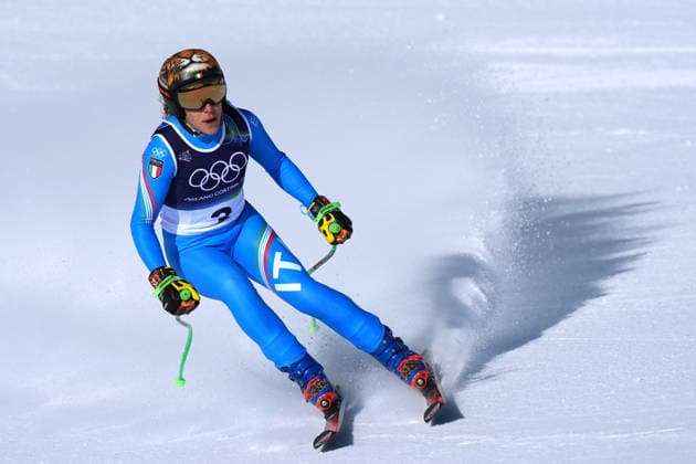 Federica Brignone at the finish line of a women s downhill alpine skiing race at the 2026 Winter Olympics in Cortina, Italy, on Saturday, February 8, 2026.  Copyright: xDavidexSpada LaPressex