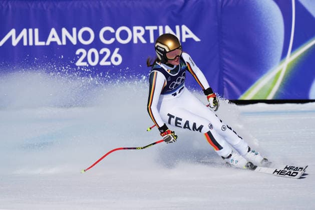 Emma Aicher at the finish line of a women s downhill alpine skiing race at the 2026 Winter Olympics in Cortina, Italy, on Saturday, February 8, 2026.  Copyright: xDavidexSpada LaPressex