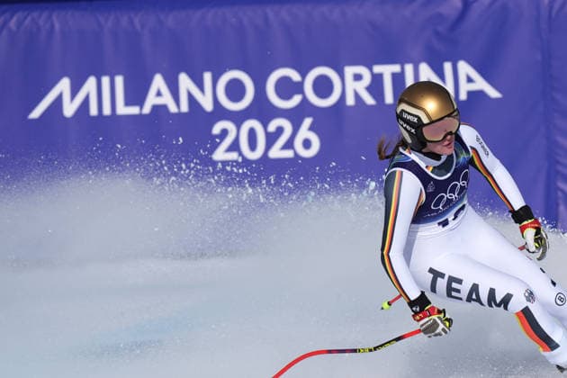 Emma Aicher at the finish line of a women s downhill alpine skiing race at the 2026 Winter Olympics in Cortina, Italy, on Saturday, February 8, 2026.  Copyright: xDavidexSpada LaPressex
