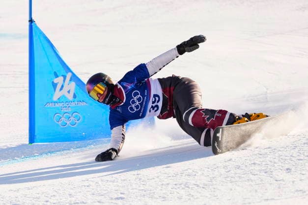 February 8, 2026, Livigno, Italy: Ben Heldman, from Toronto, Ont., races in the men s parallel giant slalom qualification at the Milano Cortina 2026 Winter Olympic Games, Olympische Spiele, Olympia, OS in Livigno, Italy on Sunday, Feb. 8, 2026. Canada News - February 8, 2026  - ZUMAc35_ 20260208_zaf_c35_004 Copyright: xSeanxKilpatrickx