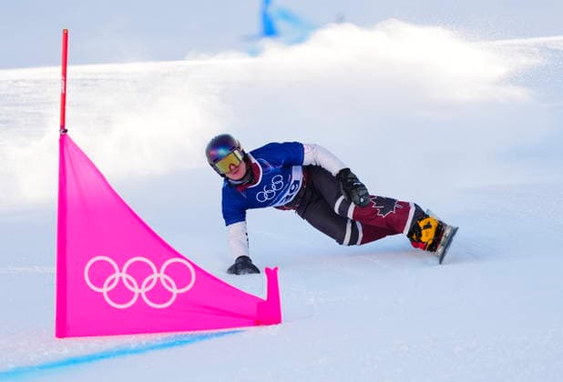 February 8, 2026, Livigno, Italy: Ben Heldman, from Toronto, Ont., races in the men s snowboarding parallel giant slalom qualification at the Milano Cortina 2026 Winter Olympic Games, Olympische Spiele, Olympia, OS in Livigno, Italy on Sunday, Feb. 8, 2026. Canada News - February 8, 2026  - ZUMAc35_ 20260208_zaf_c35_022 Copyright: xSeanxKilpatrickx