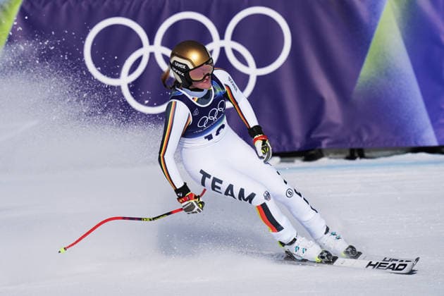 Emma Aicher at the finish line of a women s downhill alpine skiing race at the 2026 Winter Olympics in Cortina, Italy, on Saturday, February 8, 2026.  Copyright: xDavidexSpada LaPressex