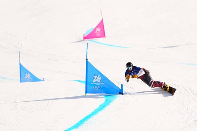 February 8, 2026, Livigno, Italy: Arnaud Gaudet, from Montcalm, Que., competes in the men s snowboarding parallel giant slalom 1 8 finals at the 2026 Winter Olympics, in Livigno, Italy, Sunday, Feb. 8, 2026. Canada News - February 8, 2026  - ZUMAc35_ 20260208_zaf_c35_031 Copyright: xSeanxKilpatrickx
