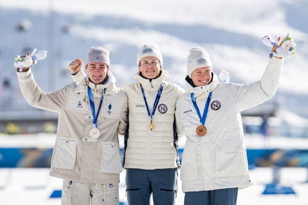 260208 Mathis Desloges of France, Johannes Hosflot Klaebo of Norway and Martin Lowstrom Nyenget of Norway celebrate on the podium after the men s 20 km cross-country skiing skiathlon during day 2 of the 2026 Winter Olympics on February 8, 2026 in Val di Fiemme. Photo: Maxim Thore BILDBYRAN kod MT MT0964 skidor cross-country skiing langrenn Olympic Games, Olympische Spiele, Olympia, OS olympics winter olympics os ol olympiska spel vinter-os olympiske leker milano cortina 2026 milan cortina 2026 milano cortina 2026 olympic games milano cortina 2026 winter olympic games milano cortina-os milano cortina-ol vinter-ol 2 bbeng herr skiathlon frankrike norge jubel *** 260208 Mathis Desloges of France, Johannes Hosflot Klaebo of Norway and Martin Lowstrom Nyenget of Norway celebrate on the podium after the men s 20 km cross country skiing skiathlon during day 2 of the 2026 Winter Olympics on February 8, 2026 in Val di Fiemme Photo Maxim Thore BILDBYRAN kod MT MT0964 skidor cross country skiing langrenn olympic games olympics winter olympics os ol olympiska spel vinter os olympiske leker milano cortina 2026 milan cortina 2026 milano cortina 2026 olympic games milano cortina 2026 winter olympic games milano cortina os milano cortina ol vinter ol 2 bbeng herr skiathlon frankrike norge jubel  Copyright: MAXIMxTHORE BB260208MT063