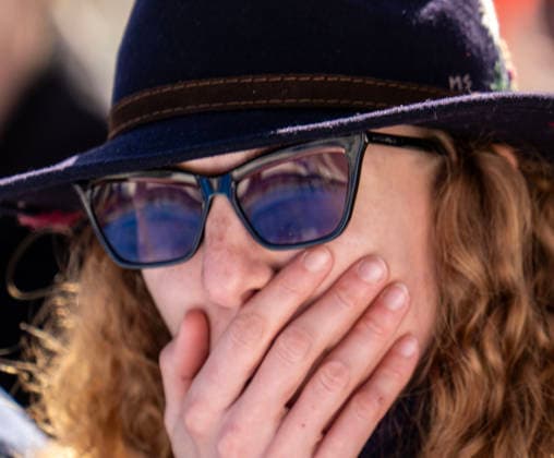 February 8, 2026, Cortina D ampezzo, Belluno, Italy: A skiing fan reacts as the Lindsey Vonn fall on the Alpine Skiing womenÃ¢â‚¬â ¢s downhill screen plays Sunday on the Tofane Alpine course during the 2026 Winter Olympics Sunday in Cortina d Ampezzo. Cortina D ampezzo Italy - ZUMAa35_ 20260208_oly_a35_003 Copyright: xDanielxA.xAndersonx