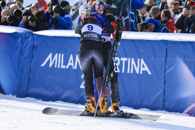 OLYMPICS - Winter Olympic Games, Olympische Spiele, Olympia, OS Milano Cortina 2026 LIVIGNO,ITALY,08.FEB.26 - OLYMPICS, SNOWBOARD - Winter Olympic Games Milano Cortina 2026, Parallel Giant Slalom, final, women, men. Image shows the rejoicing of Sabine Payer (AUT) and Zuzana Maderova (CZE).  GEPAxpictures xWolfgangxGrebien