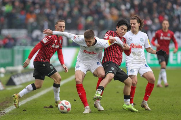 08.02.2026, xtgx, Fussball 2. Bundesliga, Hannover 96 - Holstein Kiel emspor, v.l. Marko Ivezic (Kiel, 6), Daisuke Yokota (Hannover, 18) Zweikampf, Duell, Kampf, tackle (DFL DFB REGULATIONS PROHIBIT ANY USE OF PHOTOGRAPHS as IMAGE SEQUENCES and or QUASI-VIDEO) Hannover