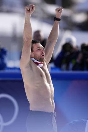 Milan Cortina Olympics: Snowboarding Benjamin Karl of Austria celebrates after winning the snowboarding men s parallel giant slalom gold at the Milan Cortina Olympics at Livigno Snow Park in Livigno, Italy, on Feb. 8, 2026.  A14AA0005256787P