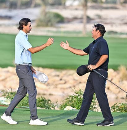 Qatar Masters 2026 - Day Four Patrick Reed of the United States shakes hands with Jacob Skov Olesen of Denmark after winning on day four of the Qatar Masters 2026 golf tournament at the Doha Golf Club in Doha, Qatar, on February 8, 2026. Doha Qatar Copyright: xNOUSHADx 776441069