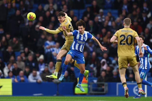 Brighton and Hove, England, 8th February 2026. Jorgen Strand Larsen of Crystal Palace and Olivier Boscagli of Brighton and Hove Albion challenge for the ball during the Brighton and Hove Albion vs Crystal Palace Premier League match at the AMEX Stadium, Brighton and Hove. Picture credit should read: Paul Terry Sportimage EDITORIAL USE ONLY. No use with unauthorised audio, video, data, fixture lists, club league logos or live services. Online in-match use limited to 120 images, no video emulation. No use in betting, games or single club league player publications. SPI_016_PT_Brighton_Crystal_Palace SPI-4514-0016