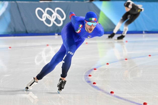 XXV Winter Olympic Games, Olympische Spiele, Olympia, OS Speed skating, Eisschnelllauf - men, 5000m, February 8, Milan. Michele Malfatti from Italy, left, and Felix Maly from Germany competes in the race. (CTKxPhoto MichalxKamaryt) CTKPhotoP2026020805680  CTKPhotoP2026020805680