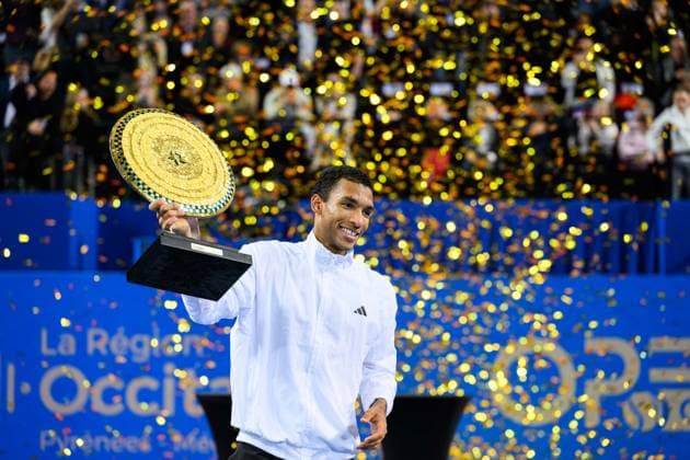 February 8, 2026, Perols, Montpellier, Occitanie, France: Felix Auger-Aliassime of Canada lifts his trophy after his match against Adrian Mannarino of France at Open Occitanie on February 8, 2026, at Sud de France Arena in Montpellier, France. Tennis 2026: Open Occitanie  - ZUMAc313 20260208_zsp_c313_002 Copyright: xFaresxChafaix