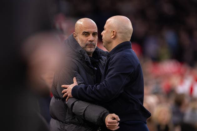 Football - FA Premier League - Liverpool FC v Manchester City FC LIVERPOOL, ENGLAND - Sunday, February 8, 2026: Liverpool s head coach Arne Slot (R) and Manchester City s head coach Josep Pep Guardiola before the FA Premier League match between Liverpool FC and Manchester City FC at Anfield. (Photo by David Rawcliffe Propaganda) LIVERPOOL Anfield MERSEYSIDE ENGLAND  Copyright: xDavidxRawcliffex P2026-02-08-Liverpool_Man_City-32