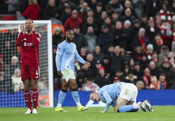 Liverpool v Manchester City, FA Premier League 08.02.26 Liverpool v Manchester City, FA Premier League Bradley Ormesher The Times Virgil van Dijk of Liverpool booked for challange on Erling Haaland of Manchester City  Copyright: xBradleyxOrmesherx NINTCHDBPICT001057460587