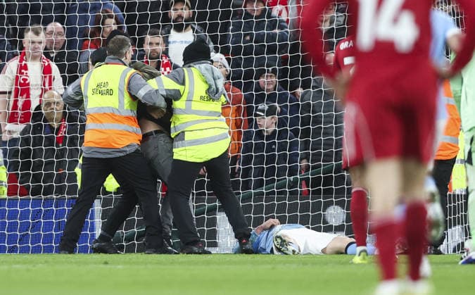 Liverpool v Manchester City, FA Premier League 08.02.26 Liverpool v Manchester City, FA Premier League Bradley Ormesher The Times Erling Haaland of Manchester City lays on floor after disallowed 3rd goal with fan being handeld by stewards  Copyright: xBradleyxOrmesherx NINTCHDBPICT001057469704