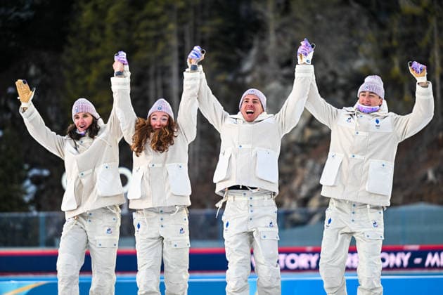 (260208) -- ANTERSELVA, Feb. 8, 2026 -- Julia Simon, Lou Jeanmonnot, Quentin Fillon Maillet and Eric Perrot (L-R) of France celebrate during the awarding ceremony of the biathlon mixed relay 4 x 6km (M+W) at the Milan-Cortina 2026 Olympic Winter games, Winterspiele,Spiele, Summer games in Anterselva, Italy, Feb. 8, 2026. ) (MICO2026)ITALY-ANTERSELVA-OLYMPIC WINTER GAMES-BIATHLON-MIXED RELAY 4x6KM(M+W) JiangxHan 