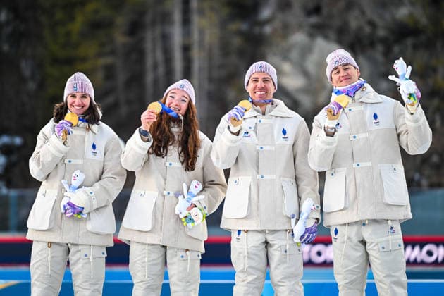 (260208) -- ANTERSELVA, Feb. 8, 2026 -- Julia Simon, Lou Jeanmonnot, Quentin Fillon Maillet and Eric Perrot (L-R) of France celebrate during the awarding ceremony of the biathlon mixed relay 4 x 6km (M+W) at the Milan-Cortina 2026 Olympic Winter games, Winterspiele,Spiele, Summer games in Anterselva, Italy, Feb. 8, 2026. ) (MICO2026)ITALY-ANTERSELVA-OLYMPIC WINTER GAMES-BIATHLON-MIXED RELAY 4x6KM(M+W) JiangxHan 