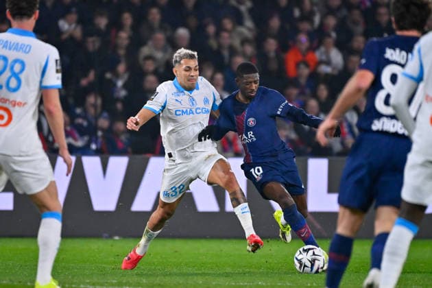 FOOTBALL : PSG vs Marseille - Ligue1 - 08 02 2026 Ousmane DEMBELE ( 10 - PSG ) and Facundo Medina ( 32 - Olympique Marseille ) during the Ligue 1 match between Paris Saint Germain and Olympique Marseille at Parc Des Princes on February 08 , 2026 in Paris, France. ( Photo by Federico Pestelini PsnewZ ) - ParisFrance  Copyright: xFedericoxPestelinix
