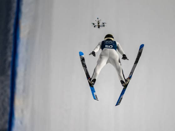 OLYMPICS - Winter Olympic Games, Olympische Spiele, Olympia, OS Milano Cortina 2026 VAL DI FIEMME,ITALY,08.FEB.26 - OLYMPICS, Ski jumping, Skispringen, Ski, nordisch - Winter Olympic Games Milano Cortina 2026, normal hill, men, training. Image shows Domen Prevc (SLO) and a drone.  GEPAxpictures xOliverxLerch