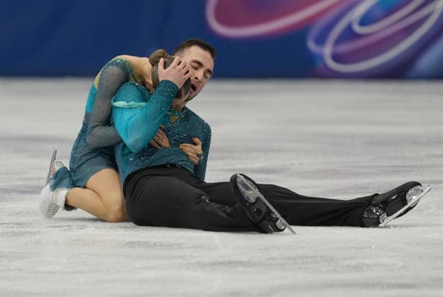 (260208) -- MILAN, Feb. 8, 2026 -- Anastasiia Metelkina (L) Luka Berulava of Georgia react after their performance during the Figure skating, Eiskunstlauf team event pair skating free skating of the Milan-Cortina 2026 Olympic Winter games, Winterspiele,Spiele, Summer games in Milan, Italy, Feb. 8, 2026. ) (MICO2026)ITALY-MILAN-OLYMPIC WINTER GAMES-FIGURE SKATING TEAM EVENT-PAIR SKATING-FREE SKATING XuexYuge 