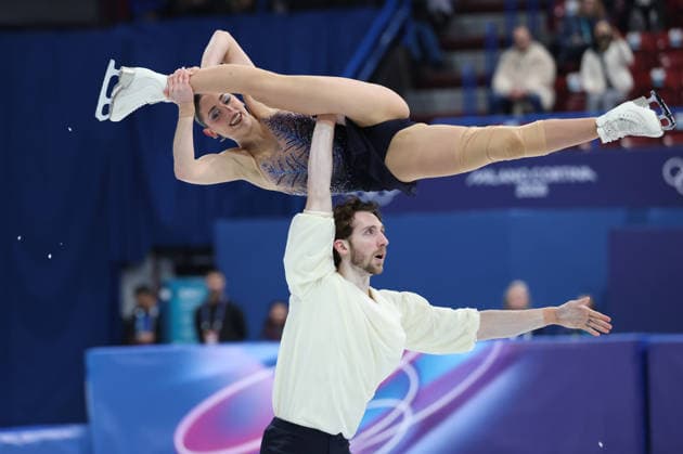 (260208) -- MILAN, Feb. 8, 2026 -- Sara Conti (R) Niccolo Macii of Italy compete during the free skating of pair skating for Figure skating, Eiskunstlauf team event at the Milan-Cortina 2026 Olympic Winter games, Winterspiele,Spiele, Summer games in Milan, Italy, Feb. 8, 2026. ) (MICO2026)ITALY-MILAN-OLYMPIC WINTER GAMES-FIGURE SKATING TEAM EVENT-PAIRING SKATING LixMing 