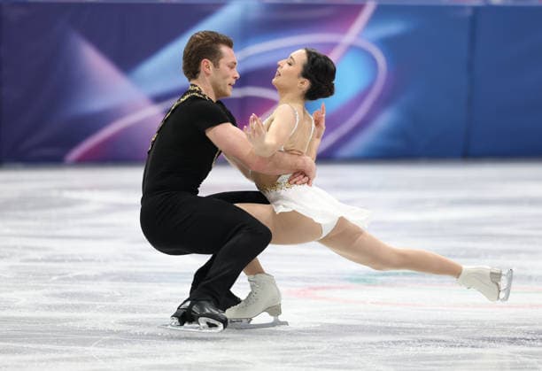 (260208) -- MILAN, Feb. 8, 2026 -- Lia Pereira (R) Trennt Michaud of Canada compete during the free skating of pair skating for Figure skating, Eiskunstlauf team event at the Milan-Cortina 2026 Olympic Winter games, Winterspiele,Spiele, Summer games in Milan, Italy, Feb. 8, 2026. ) (MICO2026)ITALY-MILAN-OLYMPIC WINTER GAMES-FIGURE SKATING TEAM EVENT-PAIRING SKATING LixMing 