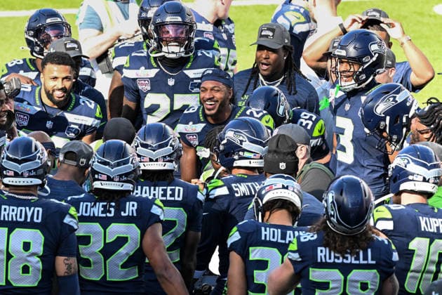 The Seattle Seahawks huddle up before Super Bowl LX between the Seahawks and the New England Patriots at Levi s Stadium in Santa Clara, California on Sunday, February 8, 2026.  SBP20260208412 DAVIDxTULIS