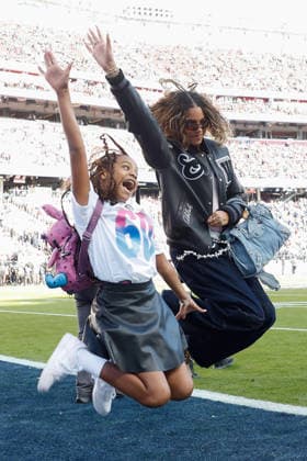 Singer-songwriter Beyonce jumps on the field for a photograph with her daughter before the start of Super Bowl LX at at Levi s Stadium in Santa Clara, California on Sunday, February 8, 2026.  SBP202602082113 JOHNxANGELILLO