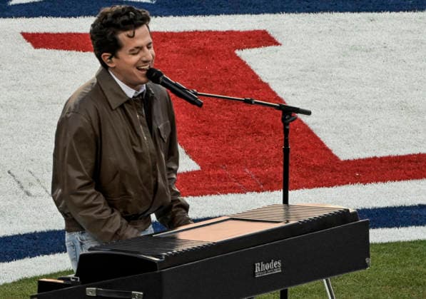 Charlie Puth sings the National Anthem before the start of Super Bowl LX at at Levi s Stadium in Santa Clara, California on Sunday, February 8, 2026. The New England Patriots will face the Seattle Seahawks in the game.  SBP20260208812 JONxSOOHOO