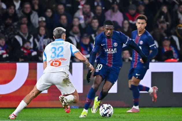 FOOTBALL : PSG vs Marseille - Ligue1 - 08 02 2026 Ousmane DEMBELE ( 10 - PSG ) and Facundo Medina ( 32 - Olympique Marseille ) during the Ligue 1 match between Paris Saint Germain and Olympique Marseille at Parc Des Princes on February 08 , 2026 in Paris, France. ( Photo by Federico Pestelini PsnewZ ) - ParisFrance  Copyright: xFedericoxPestelinix