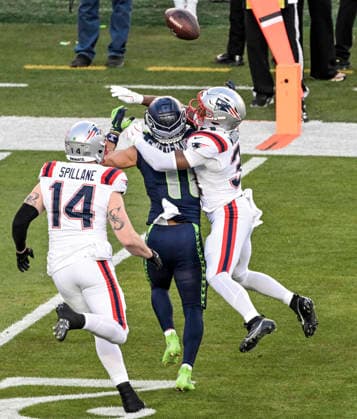 New England Patriots safety Craig Woodson (31) breaks up a pass intended for Seattle Seahawks wide receiver Jaxon Smith-Njigba (11) as New England Patriots linebacker Robert Spillane (14) comes to assist in the first quarter of Super Bowl LX at at Levi s Stadium in Santa Clara, California on Sunday, February 8, 2026.  SBP20260208820 JONxSOOHOO