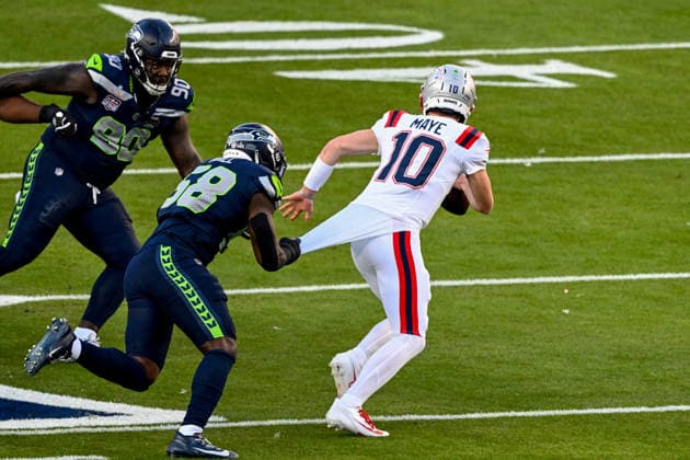 New England Patriots quarterback Drake Maye (10) is sacked by Seattle Seahawks linebacker Derick Hall (58) for a loss of 10 yards in the first quarter of Super Bowl LX at Levi s Stadium in Santa Clara, California on Sunday, February 8, 2026.  SBP20260208437 DAVIDxTULIS