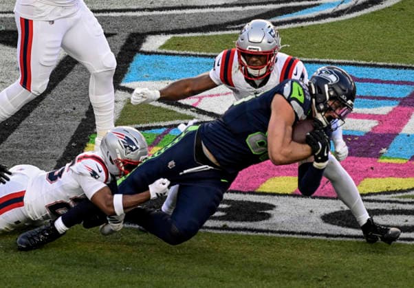 Seattle Seahawks tight end AJ Barner (88) dives for a first down against the New England Patriots in the first quarter of Super Bowl LX at at Levi s Stadium in Santa Clara, California on Sunday, February 8, 2026.  SBP20260208823 JONxSOOHOO