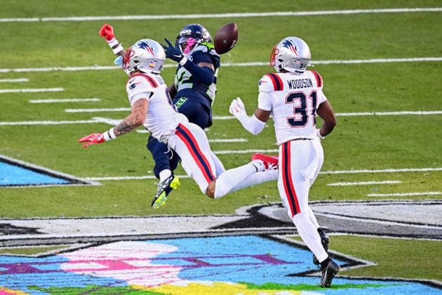 Seattle Seahawks wide receiver Rashid Shaheed (22) tries to make a catch while being defended by New England Patriots cornerback Christian Gonzalez (0) in the second quarter of Super Bowl LX at Levi s Stadium in Santa Clara, California on Sunday, February 8, 2026.  SBP20260208443 DAVIDxTULIS