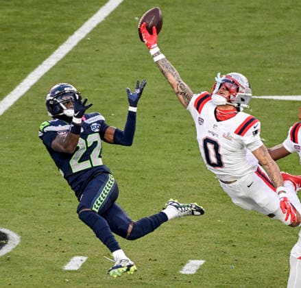New England Patriots cornerback Christian Gonzalez (0) breaks up a pass intended for Seattle Seahawks wide receiver Rashid Shaheed (22) in the second quarter of Super Bowl LX at at Levi s Stadium in Santa Clara, California on Sunday, February 8, 2026.  SBP20260208826 JONxSOOHOO