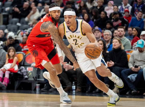 February 8, 2026, Toronto, On, Canada: Indiana Pacers guard Andrew Nembhard (2) drives pas Toronto forward Raptors Brandon Ingram (3) during first half NBA, Basketball Herren, USA action in Toronto on Sunday Feb. 8, 2026. Canada News - February 8, 2026  - ZUMAc35_ 20260208_zaf_c35_202 Copyright: xFrankxGunnx