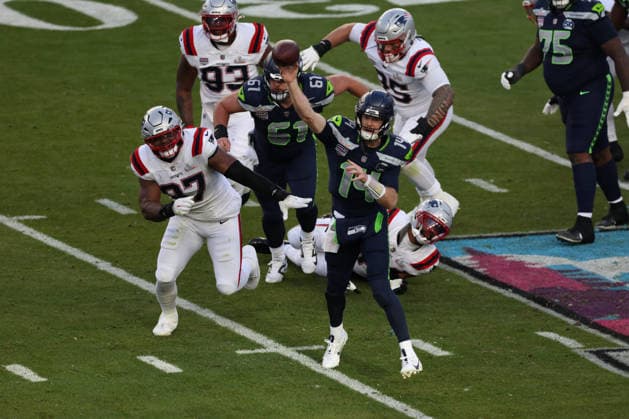 SANTA CLARA, CA - FEBRUARY 08: QB Sam Darnold (14) of the Seattle Seahawks passes after avoiding a sack during the Seattle Seahawks versus the New England Patriots Super Bowl LX game on February 8, 2026, at Levi s Stadium in Santa Clara, CA. (Photo by Matthew Huang Icon Sportswire) NFL, American Football Herren, USA FEB 08 Super Bowl LX Seahawks vs Patriots EDITORIAL USE ONLY Icon26010112196