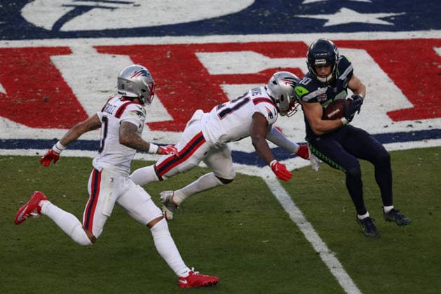 SANTA CLARA, CA - FEBRUARY 08: S Jaylinn Hawkins (21) of the New England Patriots tackles WR Cooper Kupp (10) of the Seattle Seahawks during the Seattle Seahawks versus the New England Patriots Super Bowl LX game on February 8, 2026, at Levi s Stadium in Santa Clara, CA. (Photo by Matthew Huang Icon Sportswire) NFL, American Football Herren, USA FEB 08 Super Bowl LX Seahawks vs Patriots EDITORIAL USE ONLY Icon26010112205