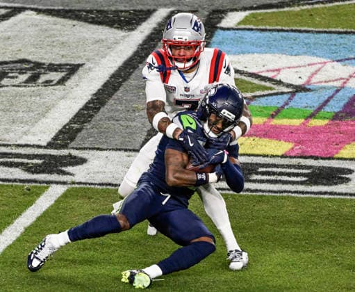 Seattle Seahawks wide receiver Rashid Shaheed (22) is tackled by New England Patriots cornerback Carlton Davis III (7) in the third quarter of Super Bowl LX at at Levi s Stadium in Santa Clara, California on Sunday, February 8, 2026.  SBP20260208850 JONxSOOHOO